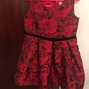 Red and black Party dress with velvet trimming.